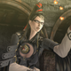 Bayonetta blows a kiss made of red hearts.